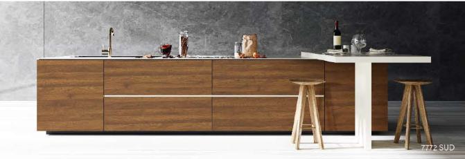 Brown wood laminate kitchen counter and table with suede finish, visible wood grain texture and modern minimalist design