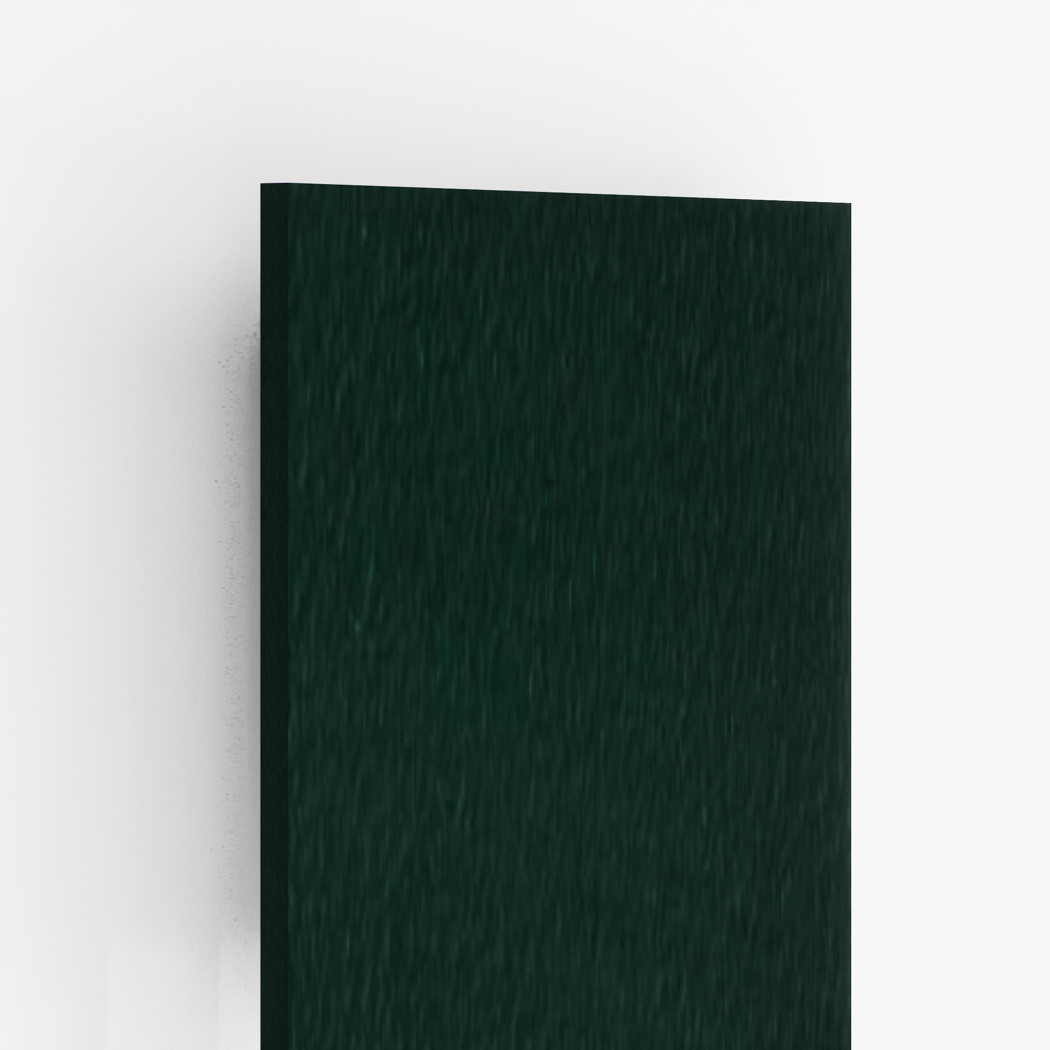 Green suede finish plain laminate with textured surface and subtle sheen, showing thickness and edge detail.