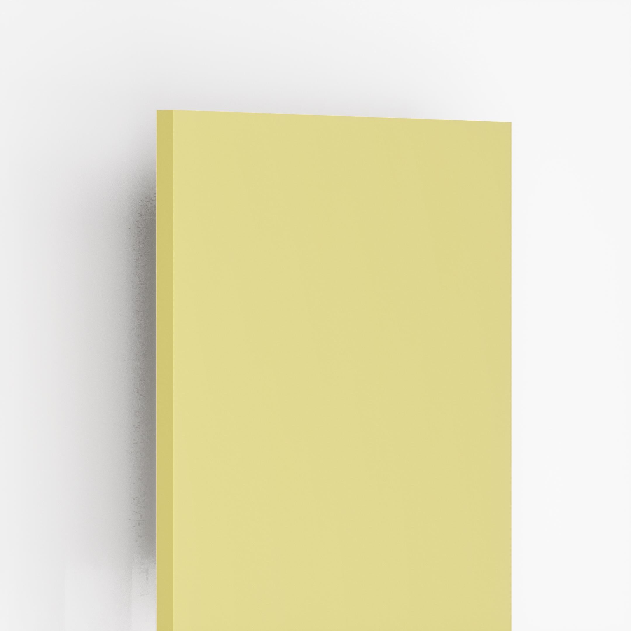 Light yellow plain laminate sheet with suede finish and smooth texture displayed on white background