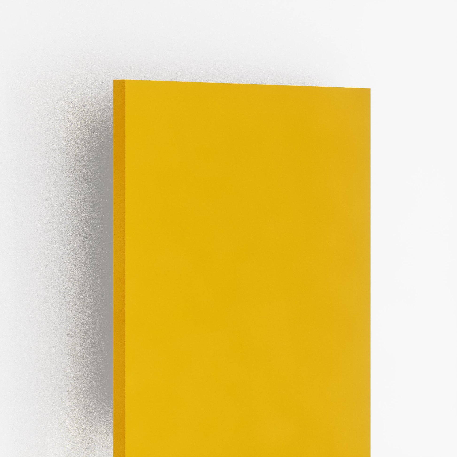 Yellow suede laminate sheet with matte finish and plain color, showing edge and surface texture.