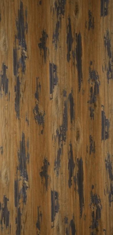 Brown wood laminate with suede finish and dark flecks, showing wood grain texture and pattern.