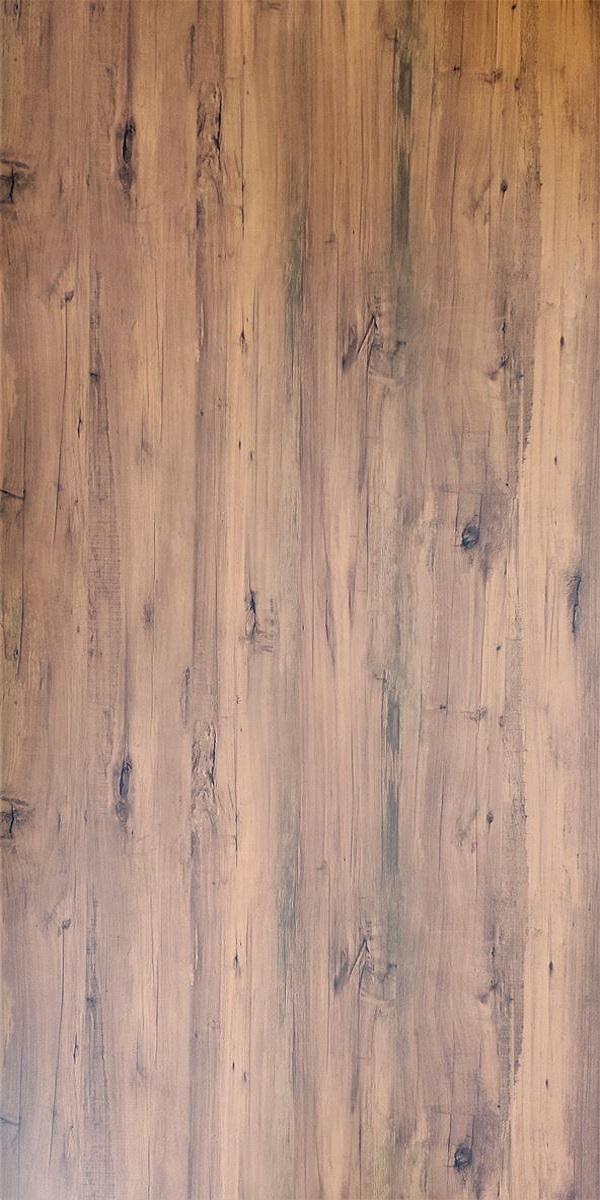 Brown wood laminate with suede finish and wood grain texture, featuring knots and darker streaks, in a vertical plank