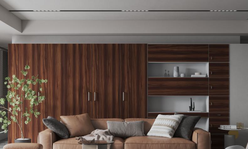 Brown wood grain laminate wall with suede finish, used in modern living room with furniture and decorative elements.