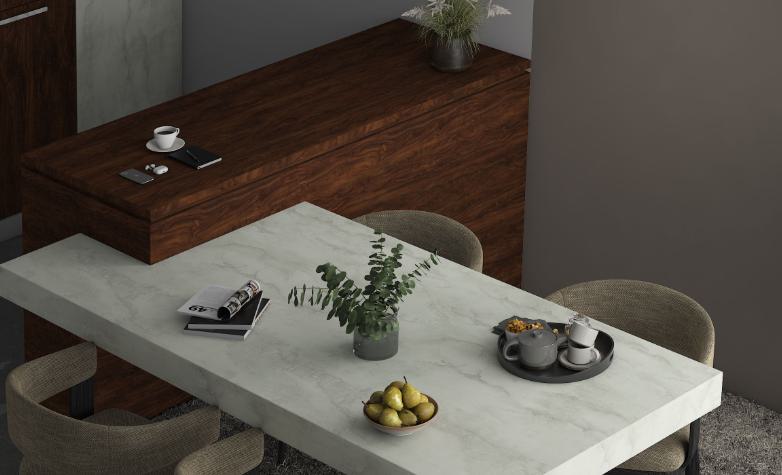 Brown wood laminate texture with visible grain on furniture surface in a modern dining room setting with marble table top