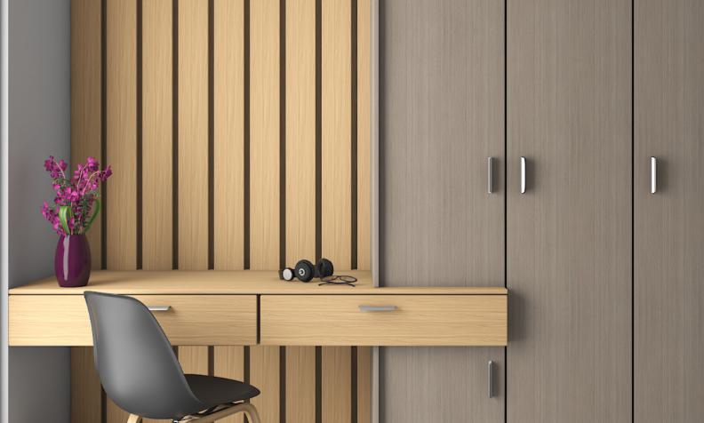 Brown wood grain laminate with textured finish on desk and wall panels, featuring vertical slats and smooth drawers.