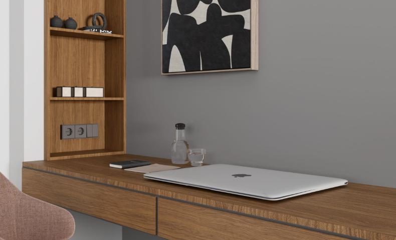 Brown wood grain laminate desk and shelving unit with suede finish and visible wood texture in a modern room setting