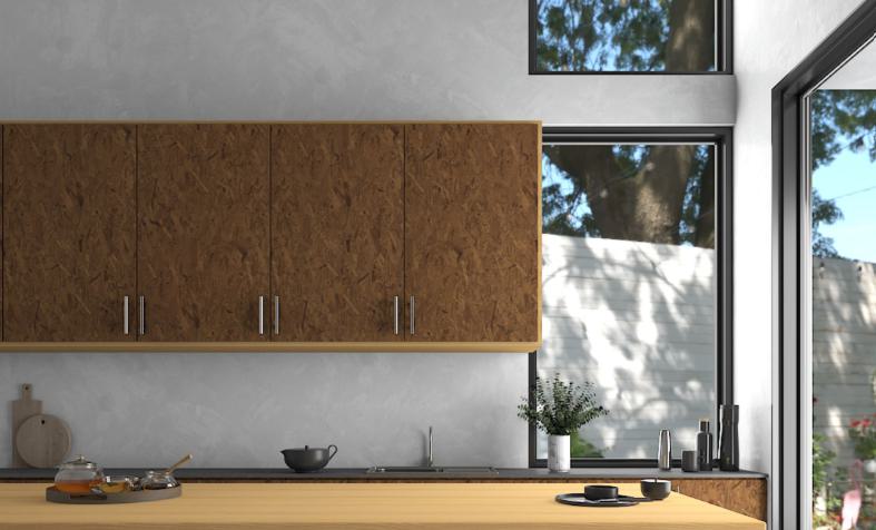 Brown wood laminate cabinet doors with textured OSB finish in a modern kitchen setting with natural light.