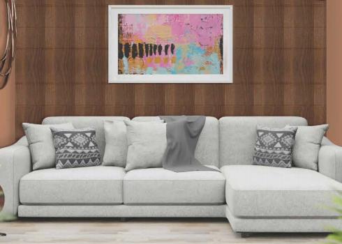 Brown wood grain laminate wall with textured finish behind a white couch in a modern living room setting