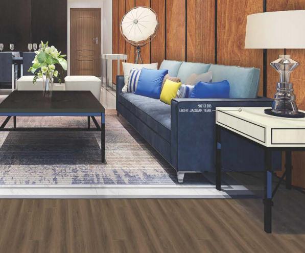 Brown wood laminate texture with visible grain used on wall panels in modern living room interior design setting