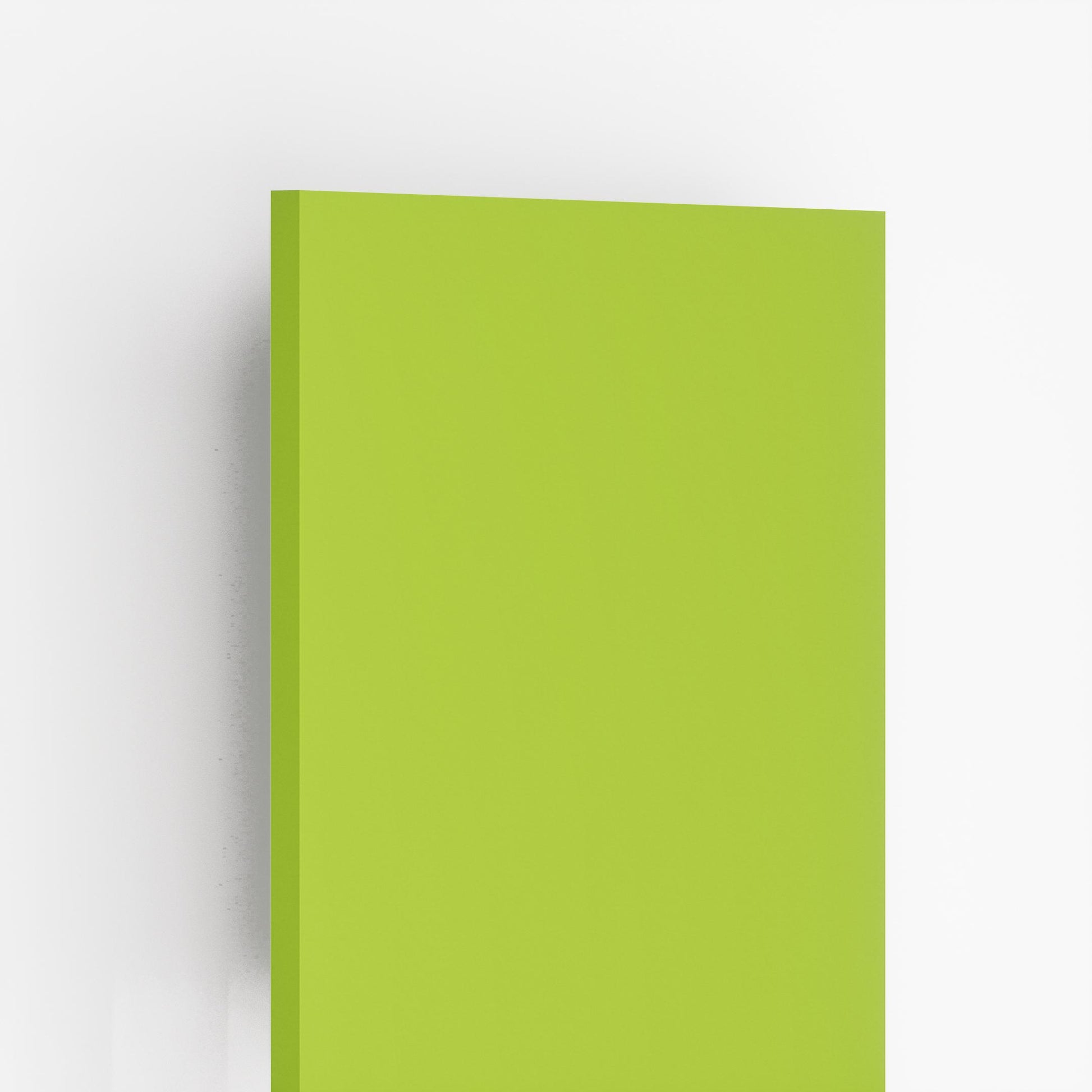 Glossy green plain laminate sheet with smooth finish and visible thickness against a white background