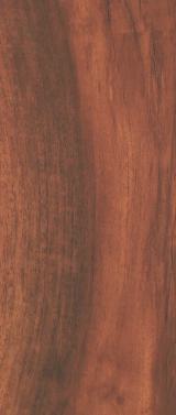 Brown wood grain laminate with textured finish and visible wood pattern and darker streaks throughout the surface