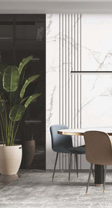 White marble laminate with gray veining and matte finish on a dining room wall with modern furniture and decor.