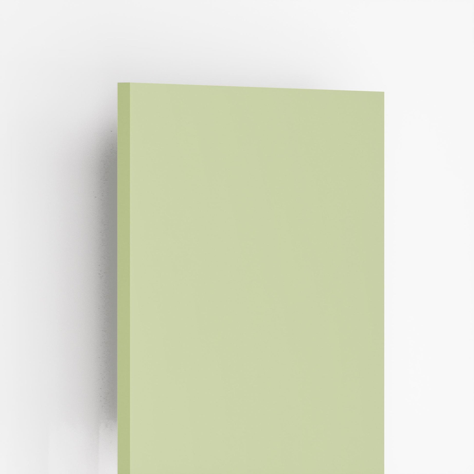 Green plain laminate with glossy finish and smooth texture, showing edge detail and uniform color.