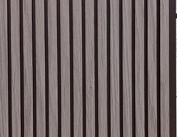 Brown fluted wall panel with matte finish and wood grain texture, showing vertical slats with dark gaps between them