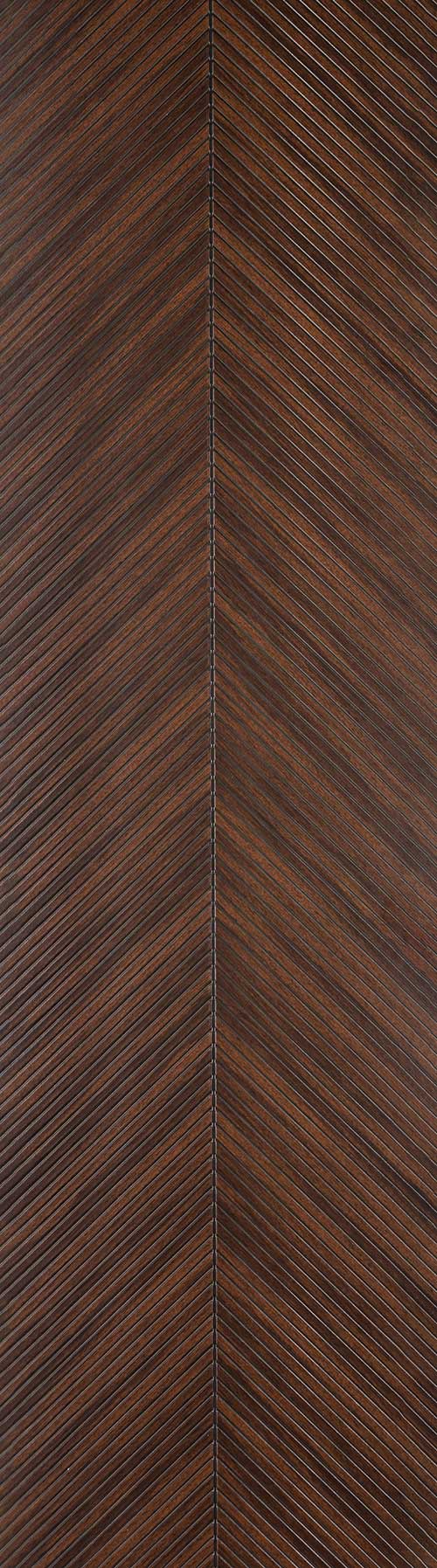 Brown fluted wall panel with matte finish and diagonal chevron pattern, showing wood grain texture and subtle sheen
