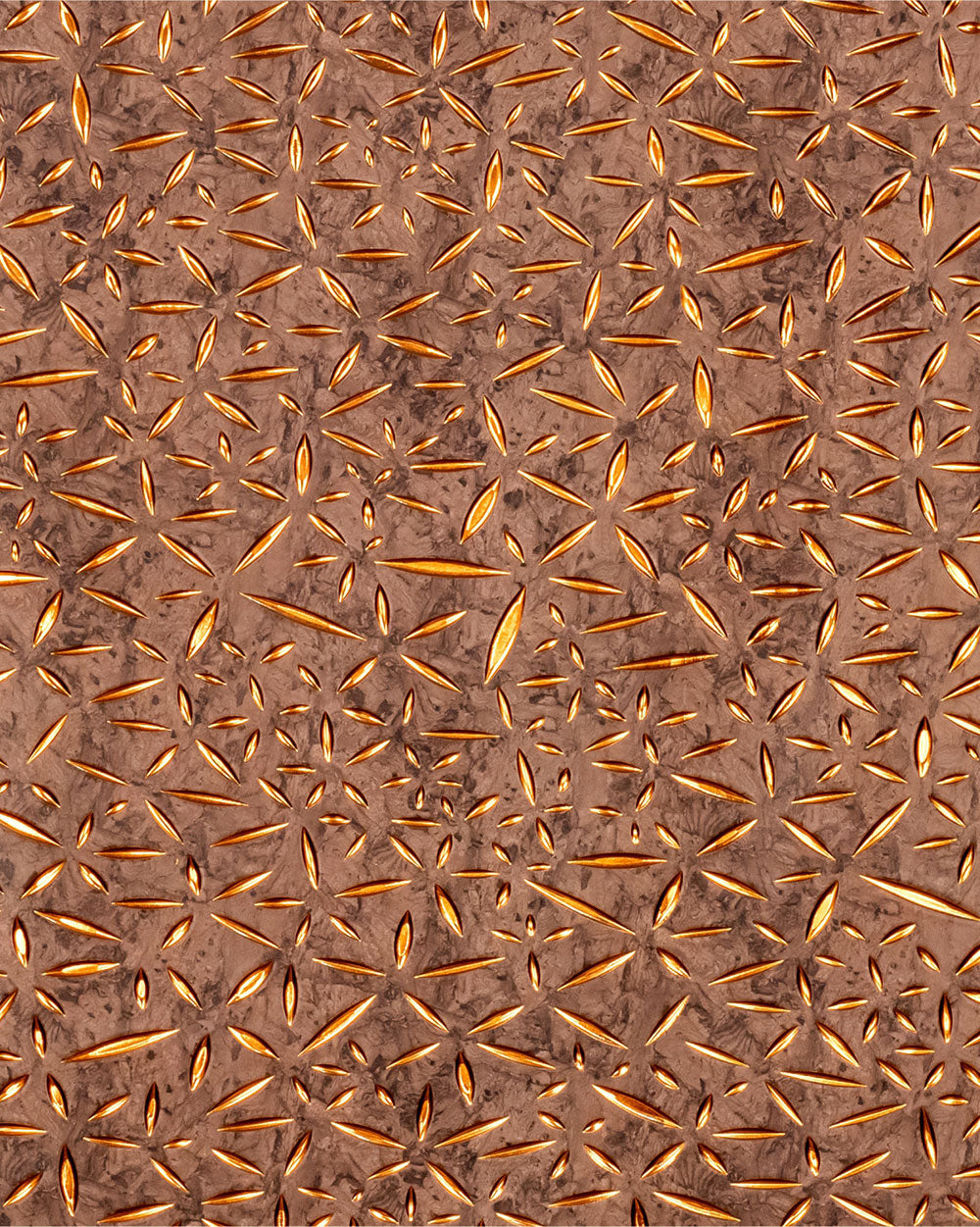 Brown textured louver panel with golden floral pattern and embossed design, featuring a repeating starburst motif and rough