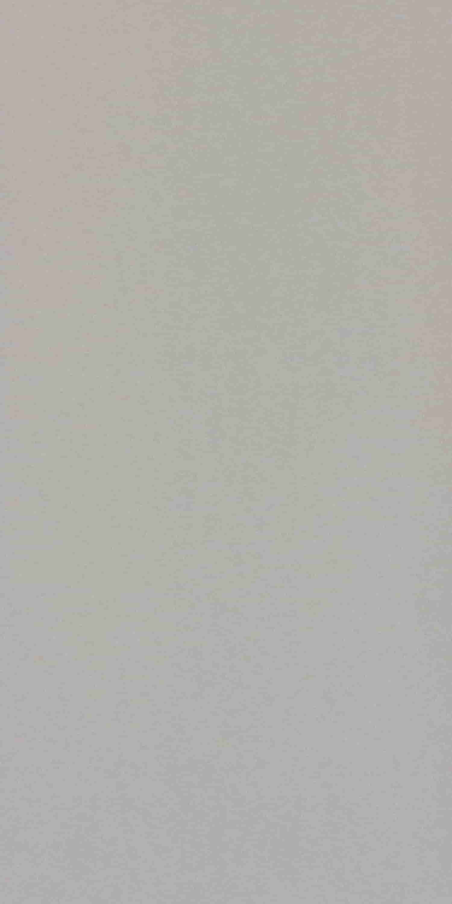 Grey abstract laminate with suede finish and subtle texture, displaying a shimmering effect in a soft gradient pattern.