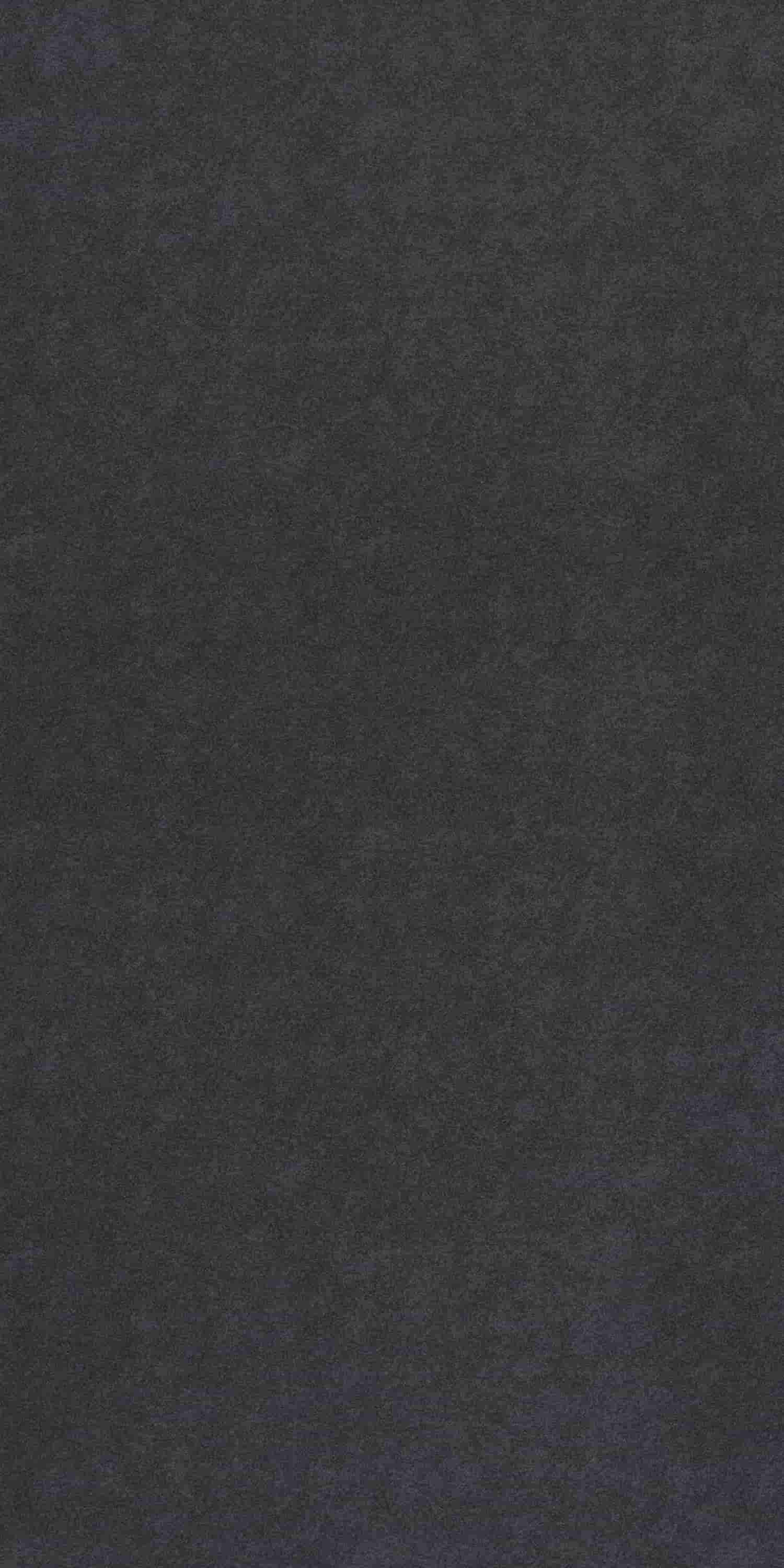 Grey suede finish laminate with solid color and textured surface