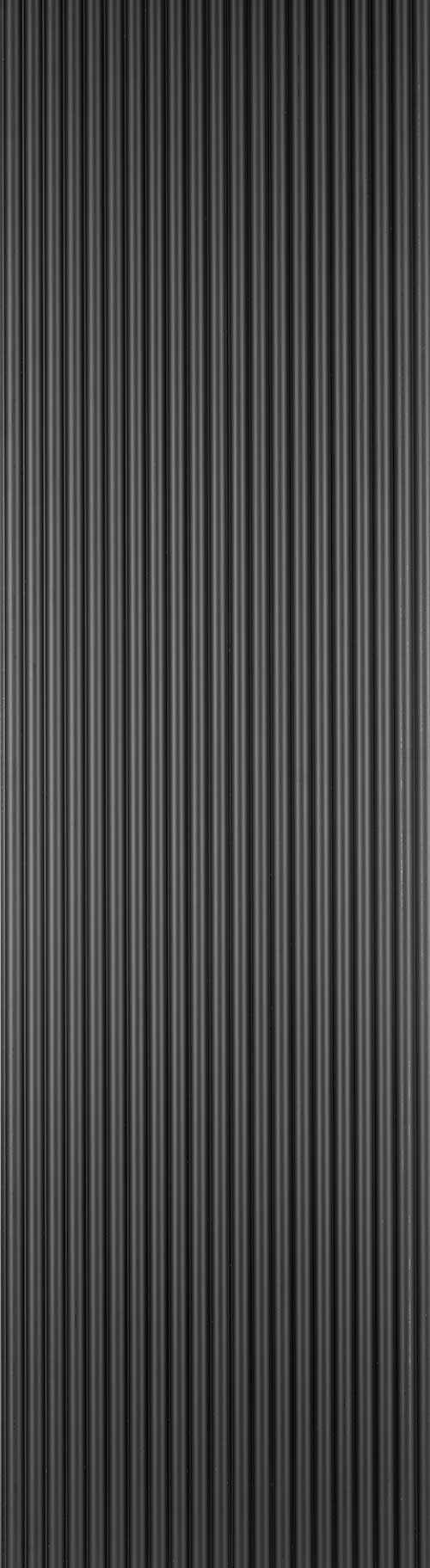 Grey matte fluted wall panel with vertical ridges and flat matte finish.