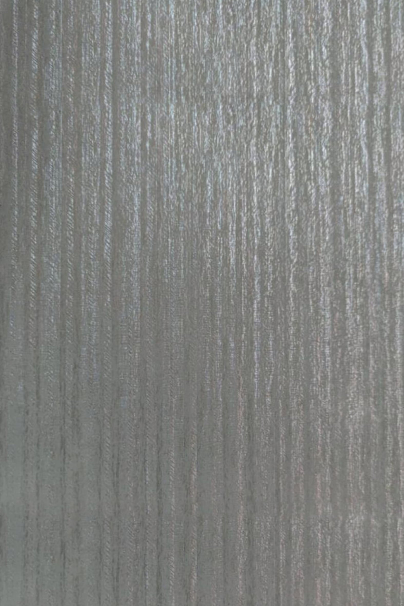 Green fluted laminate wall panel with high gloss finish and vertical ridges.