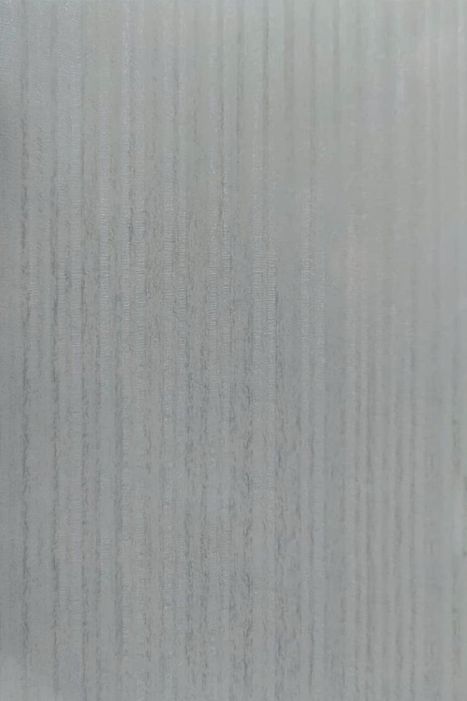 Green fluted laminate wall panel with high gloss finish and vertical ridges texture.