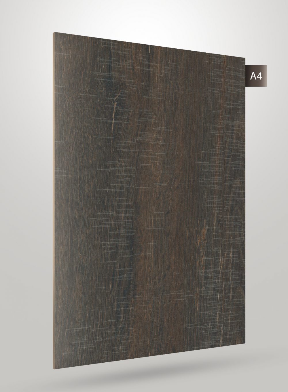 Dark brown wood laminate with matte finish and wood grain texture, showing subtle scratches and variations in tone.