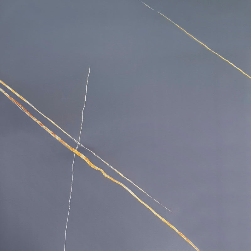 Grey marble laminate with golden and white veins, high gloss finish, smooth surface, diagonal pattern, decorative wall panel