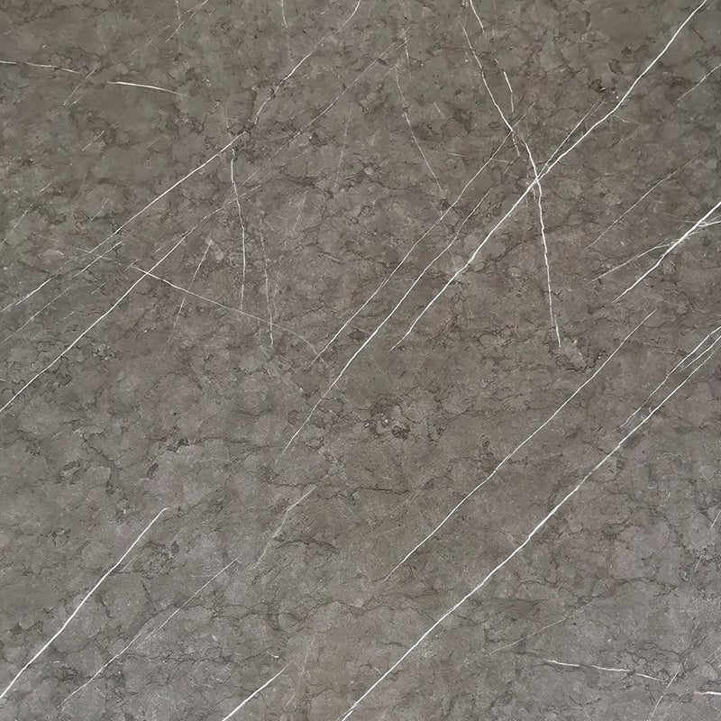 Grey marble laminate with white veining and high gloss finish showing textured surface and diagonal pattern.