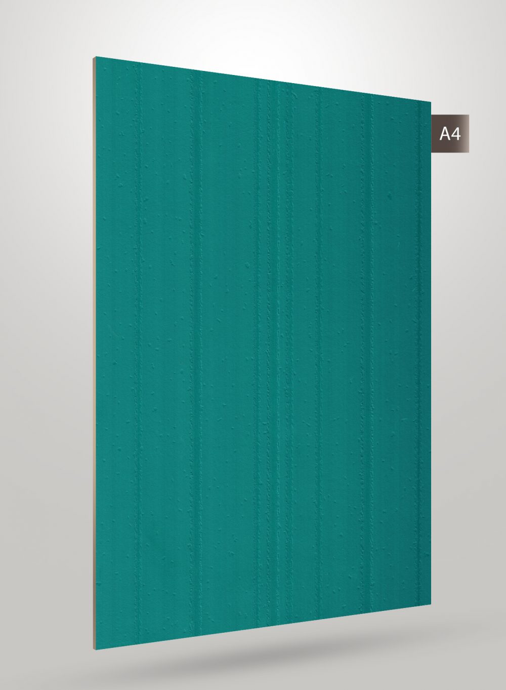Green decorative laminate with fluted pattern and matte finish, showing vertical ridges and textured surface.