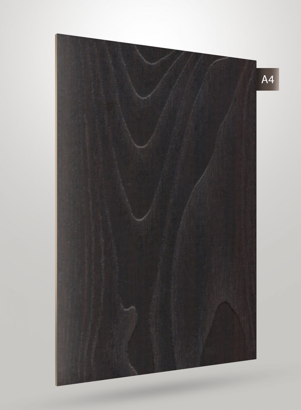 Black matte decorative wood laminate with wavy pattern and wood grain texture, showcasing a dark wood appearance.