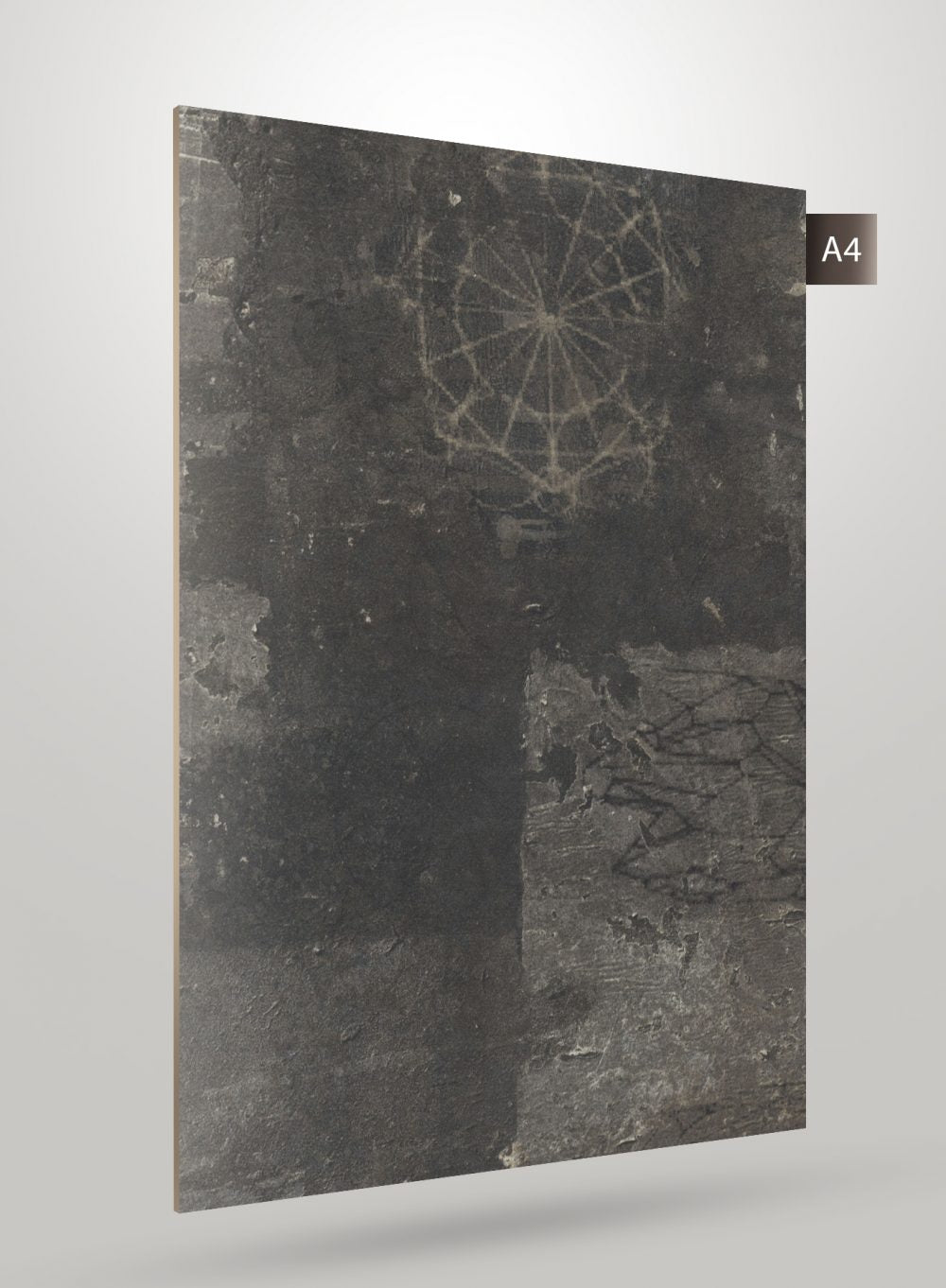Dark grey laminate sheet with abstract pattern and matte finish, showcasing texture and design details on a plain background.