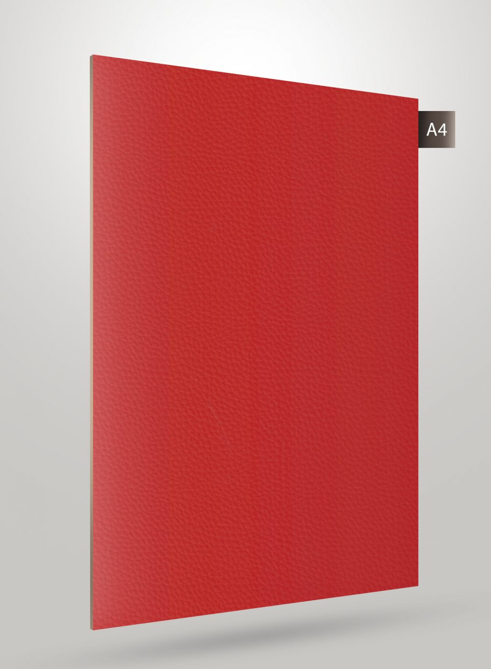 Red matte laminate sheet with textured finish and subtle grain visible on its surface, decorative solid colour type.