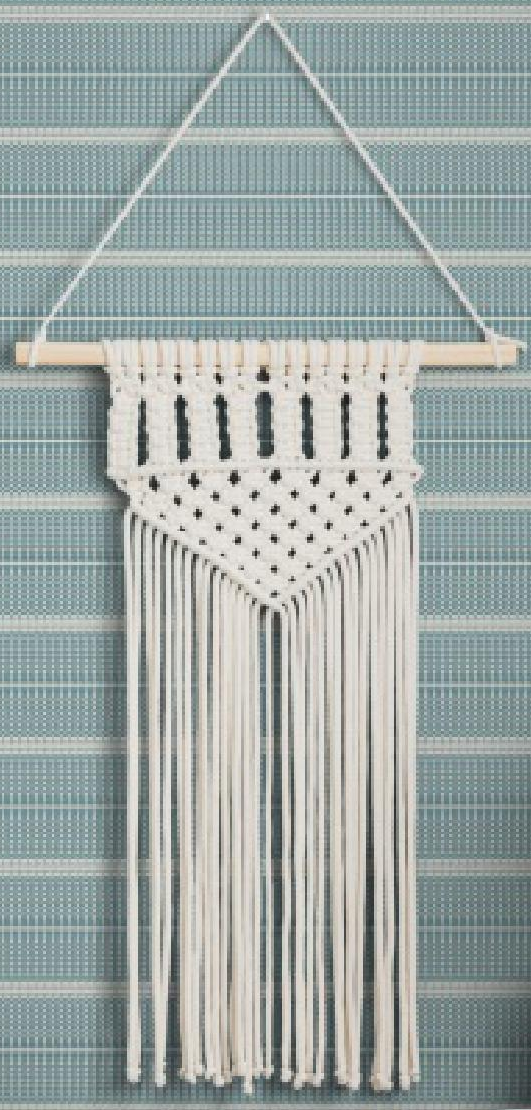 Green matte laminate with white grid pattern and macrame wall hanging.