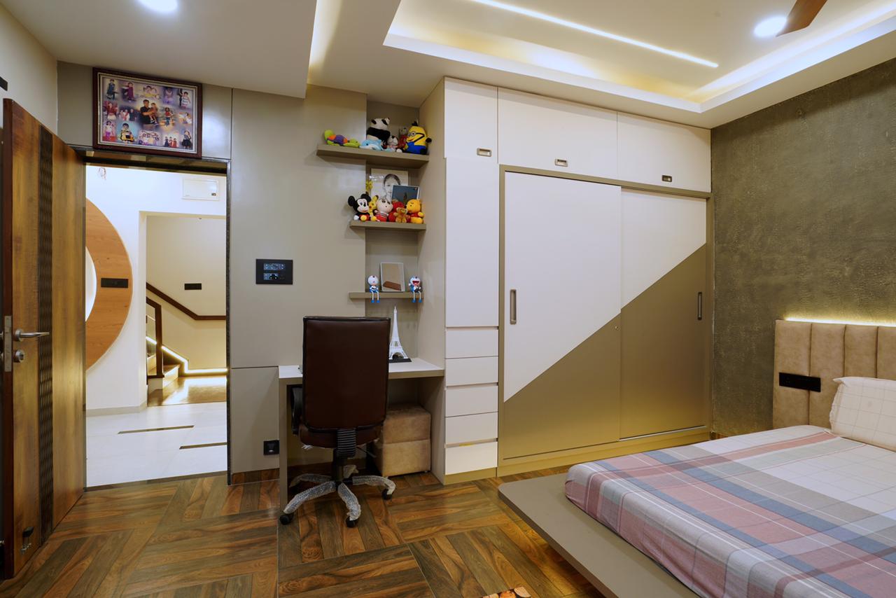Multicolored marble laminate with matte finish and veining pattern used on wardrobe in modern bedroom interior design.