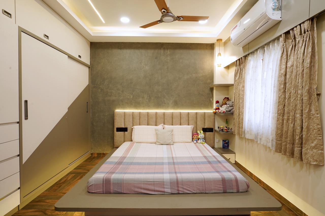 Multicolour marble laminate wall with matte finish in a modern bedroom with bed and shelves