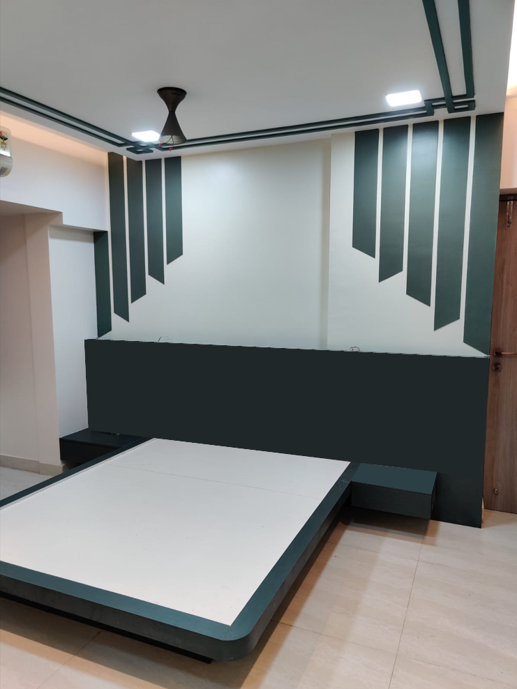 Matte dark green laminate used on bed frame and wall decor in modern bedroom interior with white accents