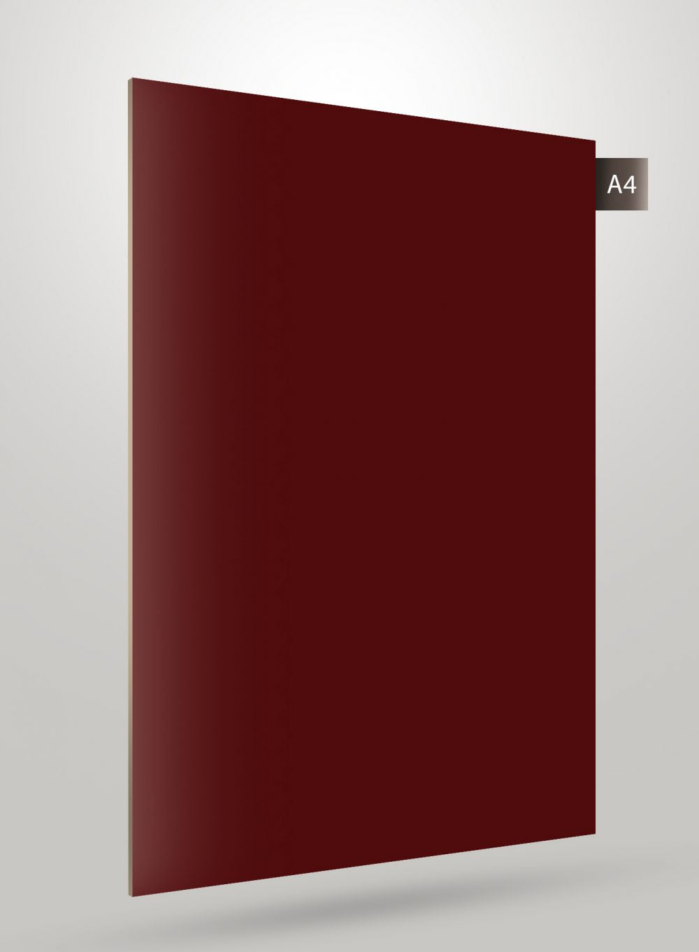 Red solid colour laminate sheet with matte finish and smooth texture, displayed at an angle with a label.