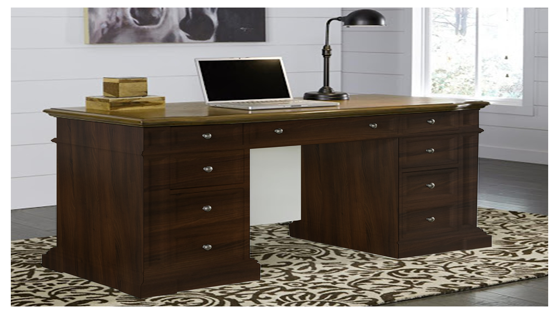 Dark wood laminate desk with wood grain texture and matte finish in a modern office setting with laptop and lamp
