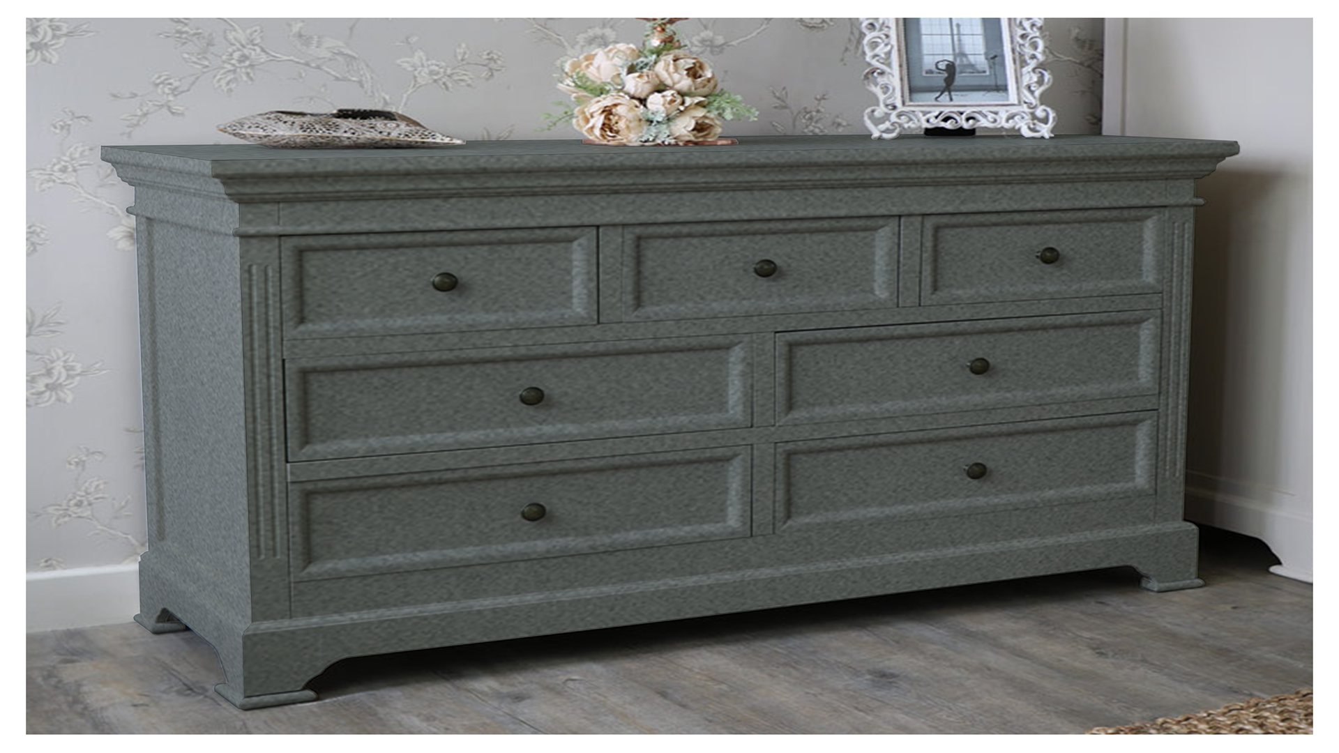 Grey fabric laminate dresser with matte finish and decorative molding, showcasing textured surface and subtle pattern.