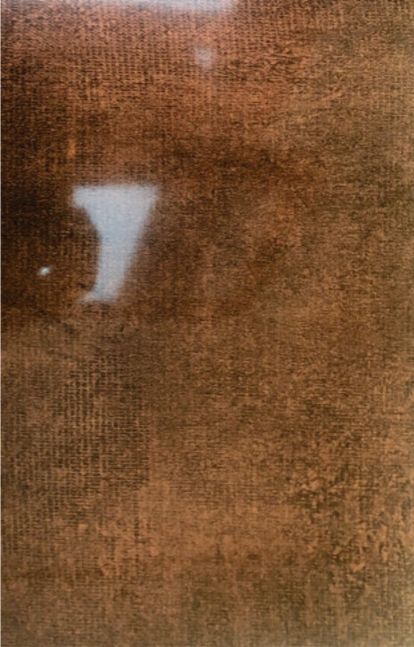 Brown textured designer laminate with subtle pattern and visible texture, showing reflective glare on its surface.