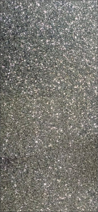 Grey metallic laminate with textured finish and sparkling pattern, showing subtle sheen and fine speckles across the surface.