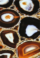 Brown marble laminate with textured agate pattern and white gold veining, showing layered stone effect and rough texture
