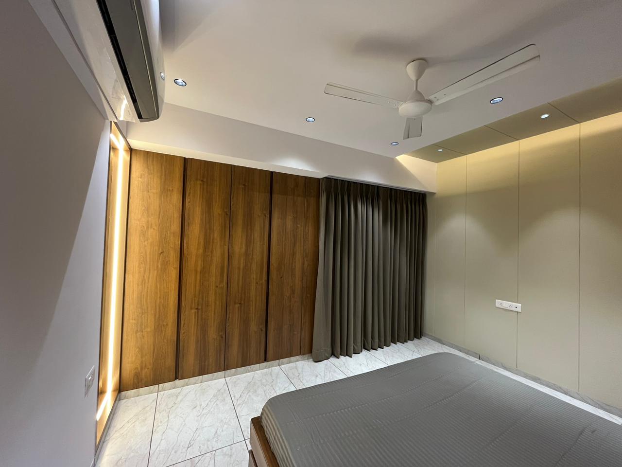 Multi-colour patterned laminate with high gloss finish, decorative laminate category, showing textured pattern and shiny