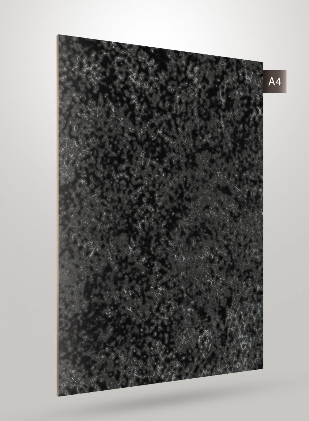 Grey matte decorative laminate with textured pattern and subtle sheen, displayed on a light grey background with a label.