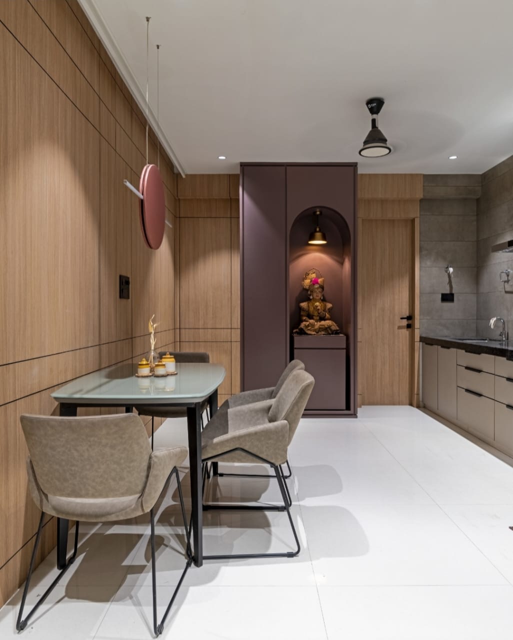 Wooden laminate wall with matte finish and wood grain texture in modern dining area with minimalist decor and subtle lighting