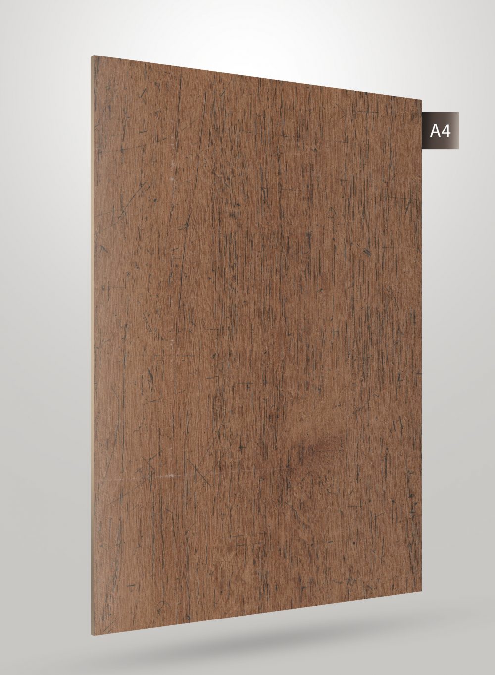 Brown wood grain decorative laminate with matte finish and visible texture and scratches on its surface.