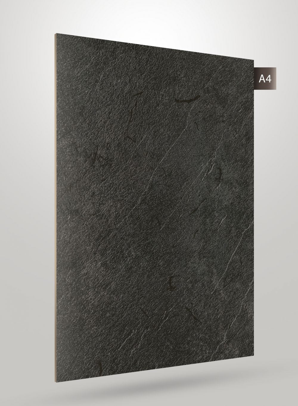Dark grey stone laminate with matte finish and textured surface showing subtle white veining and rough stone pattern