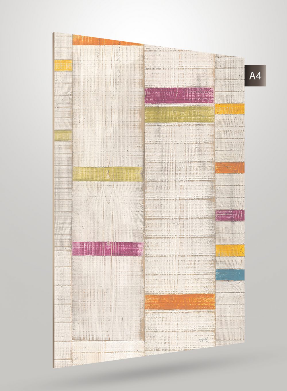 Multi-coloured patterned laminate with matte finish and textured surface, showing rectangular strips in various colours on a
