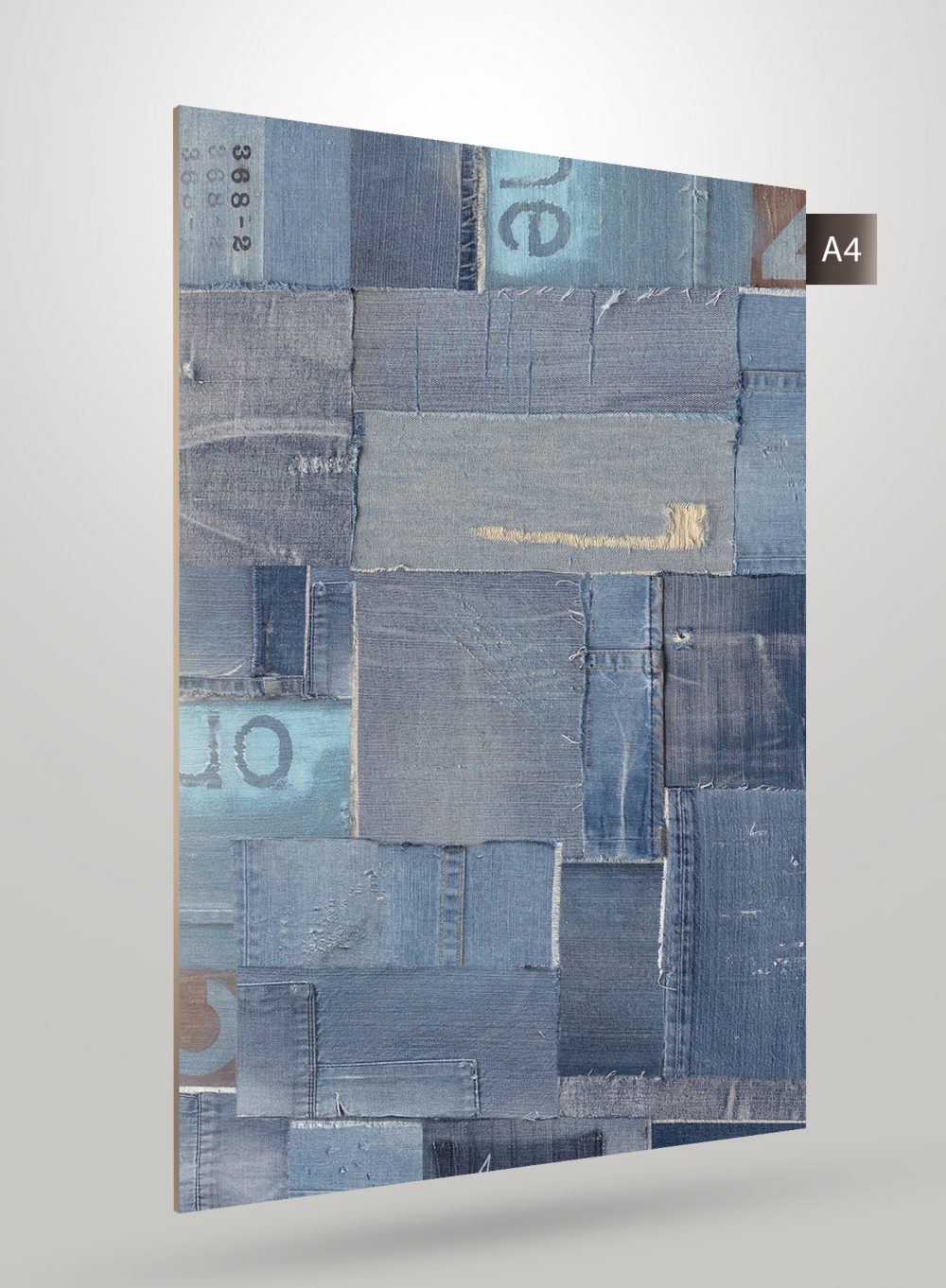 Blue patterned laminate with abstract design and matte finish, showing textured surface and stitched pattern effect.