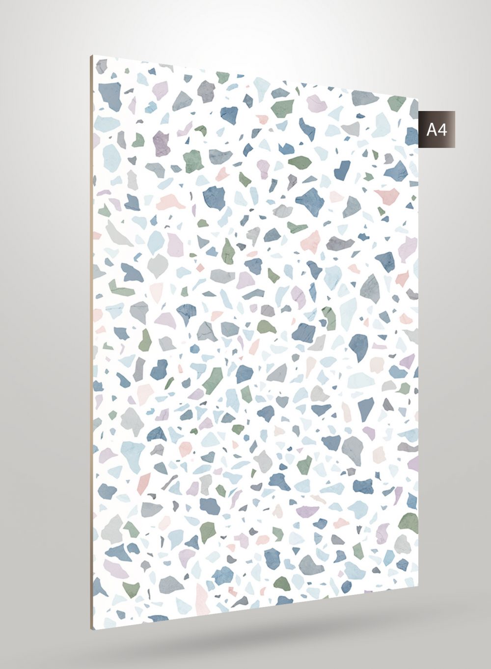 Multicolored terrazzo patterned decorative laminate with matte finish and pastel colored stone fragments on white background.